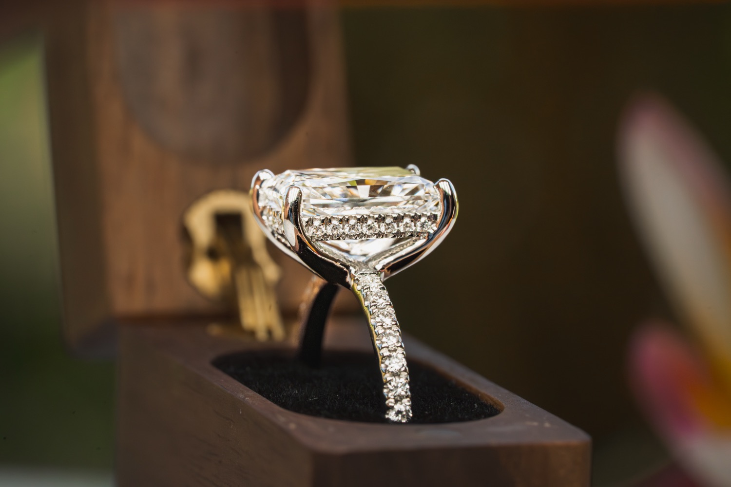 A cushion-cut diamond ring.