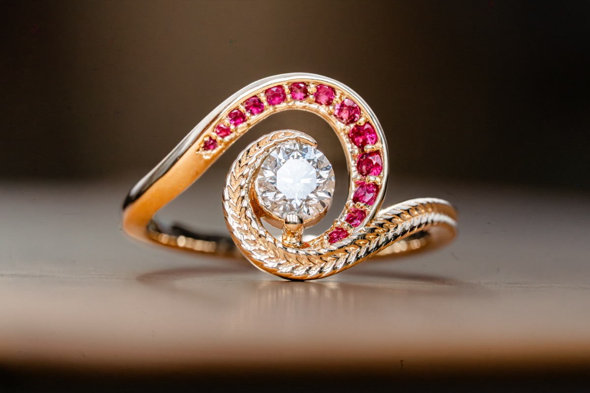 A ruby ring with a swirl setting.
